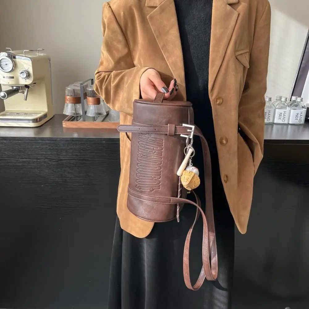 Latest Designer Cylinder Shaped Shoulder Bag With Pendant Solid Color Crossbody Bag Multifunctional Women Backpack