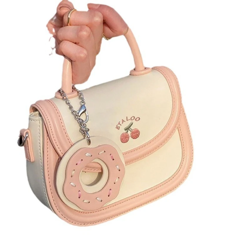 

2025 new bag cute saddle bag Japanese hand-held one-shoulder crossbody bag for women spring and summer