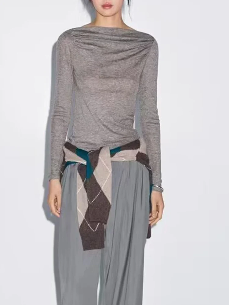 

European and American autumn and winter new women's clothing temperament boat neck pleated long sleeve knitted T-shirt top