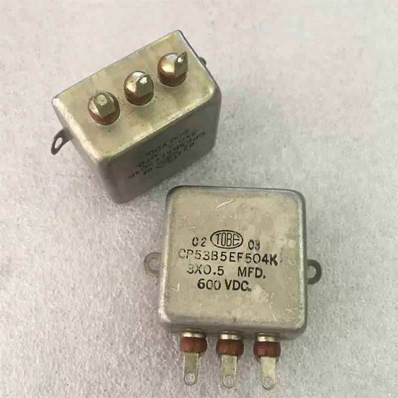 

Антикварный американский TOBE 3 × 0,5 мкФ поколения 0,47 мкФ 600 В медный корпус двойной масляный погружной конденсатор желчного пузыря