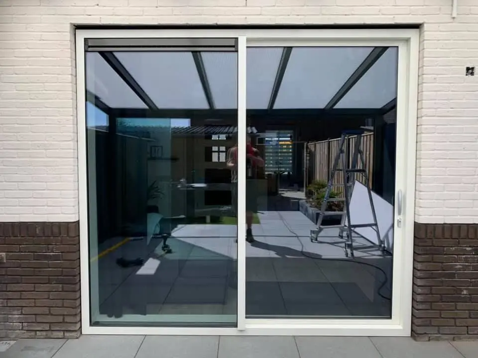 DN Puerta corrediza de vidrio personalizada para el hogar Puertas de aluminio impermeables de doble vidrio Puertas correderas de seguridad exteriores para patio de sol