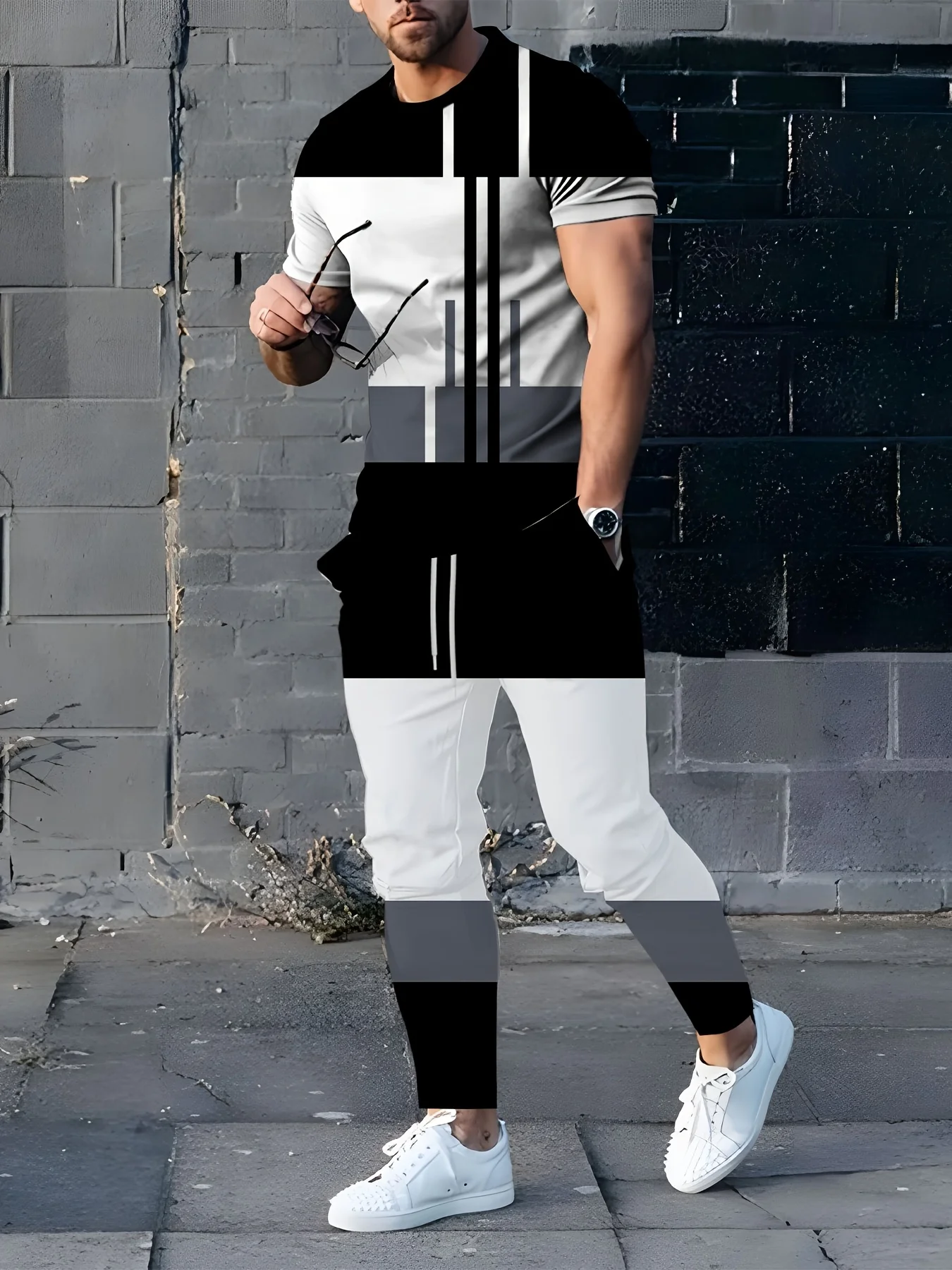 

A simple and comfortable men's two-piece set of stylish T-shirt and long pants for summer 2025