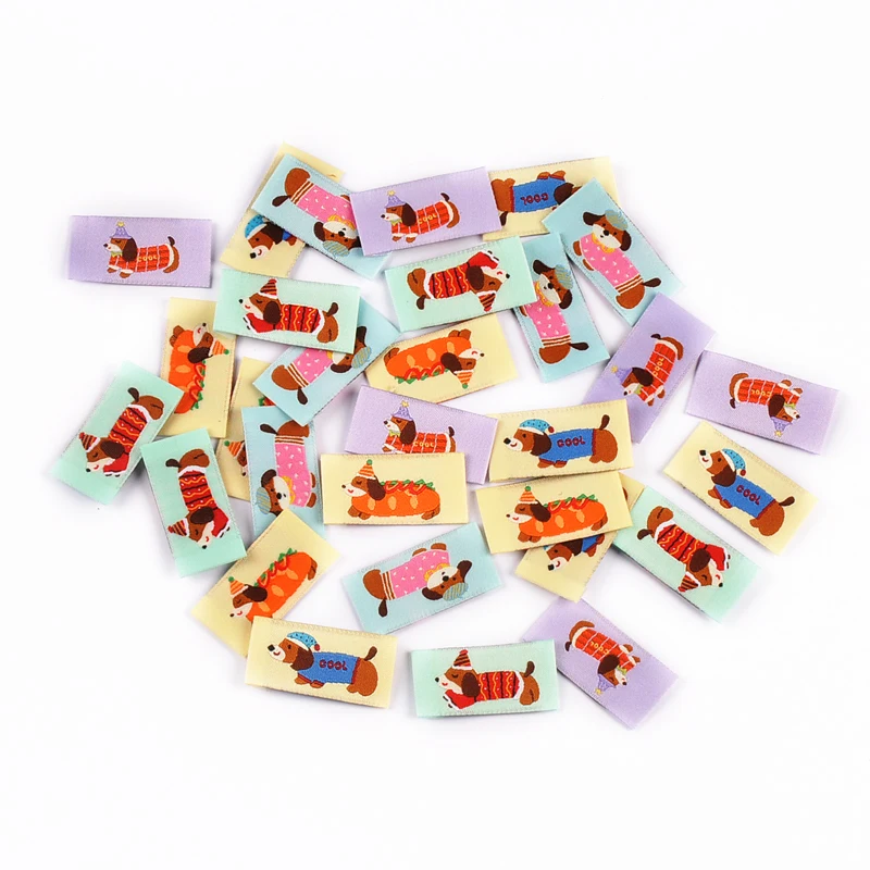 50pcs 20x40mm Mix Colorful Cartoon Dog Pattern label For Clothing Hat Bags Decorative Sewing Accessories Without Gum cp4159