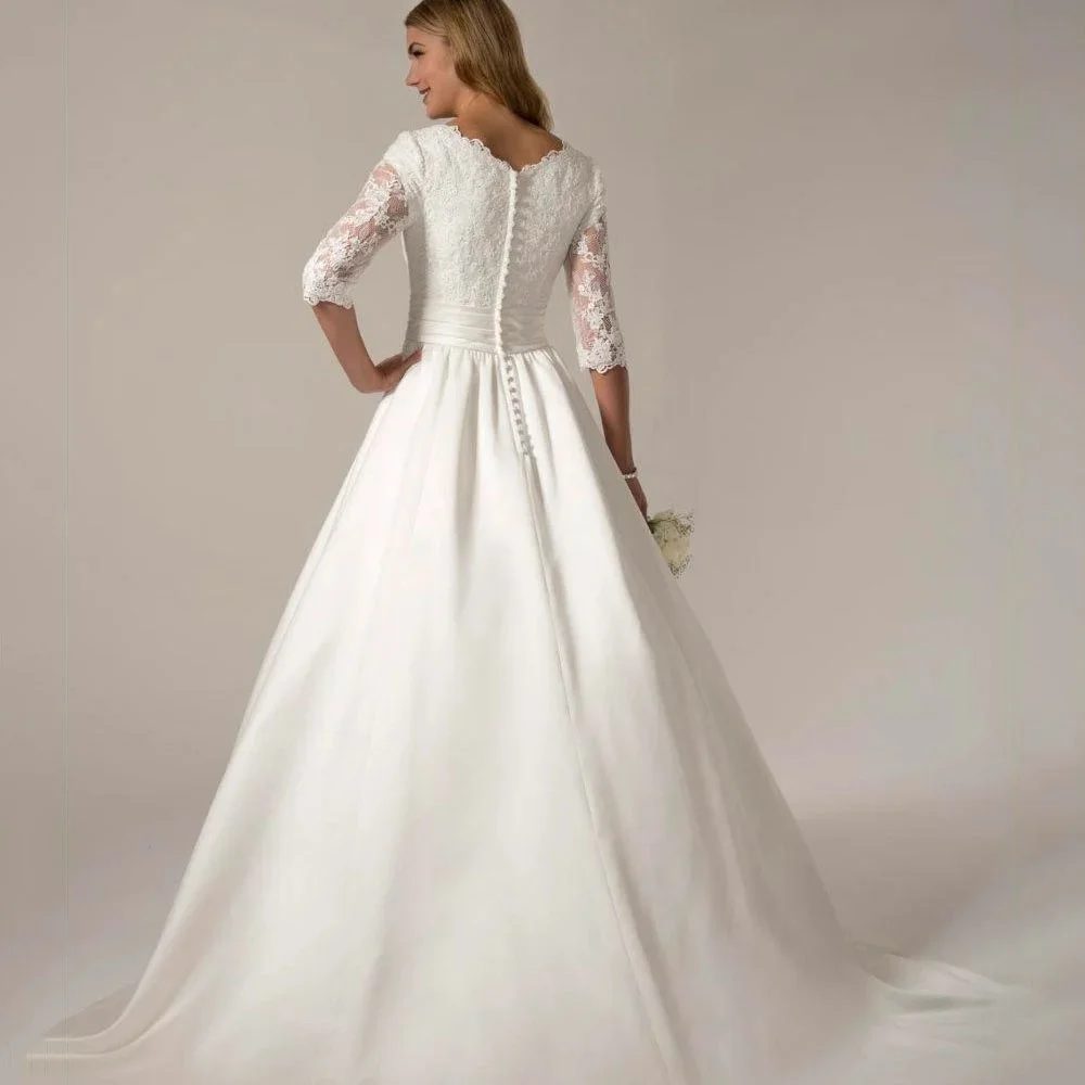 فساتين زفاف مخصصة دانتيل على شكل حرف A فاخرة رداء العروس زر فساتين زفاف أنيقة مزينة بفيستدوس دي نويفا