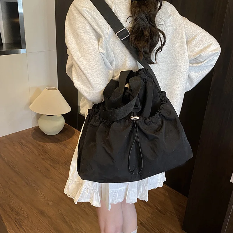 2025 New Nylon Drawstring Backpack for Women, Spacious Travel Rucksack, Water-Resistant Gym Bag, Versatile & Lightweight​