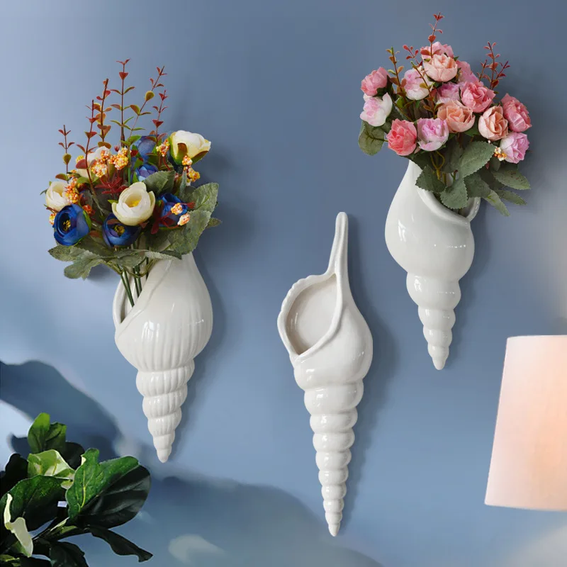 Semplice e moderno guscio di ceramica bianca conchiglia vaso 3D murale vaso di fiori creativo soggiorno sfondo parete mobili per la casa decorazione