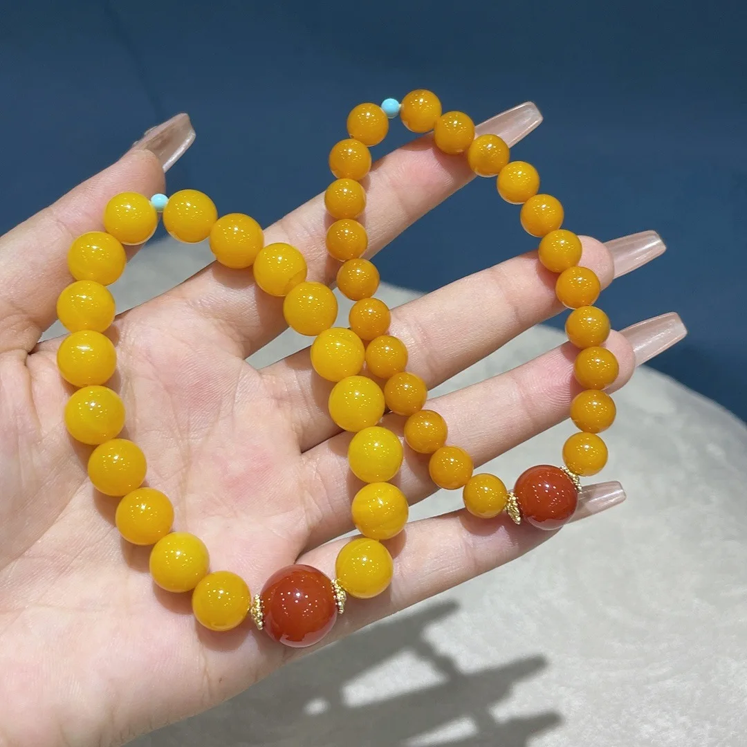 

Yellow agate with red agate bead bracelet, new Chinese transfer bead yellow bracelet for men and women