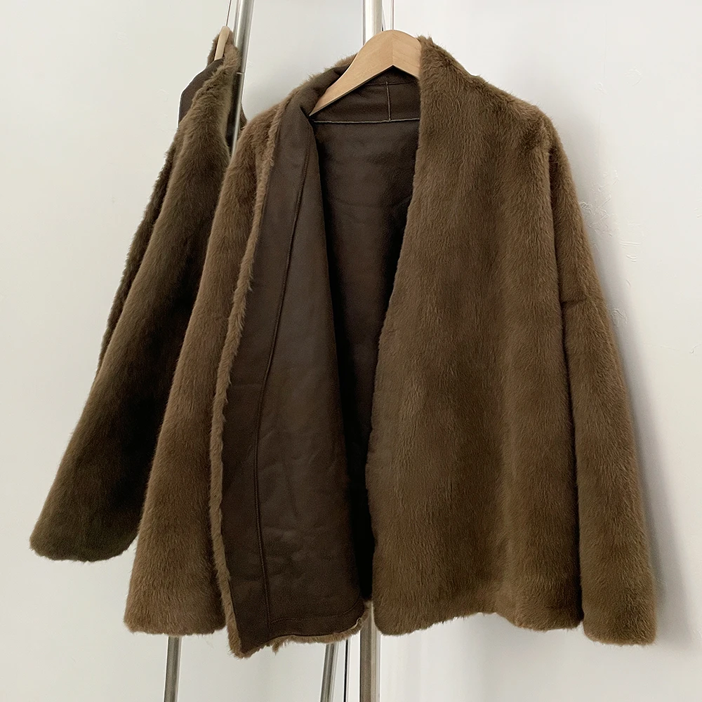 Abrigo de piel sintética para mujer, chaqueta holgada y esponjosa de manga larga para otoño e invierno, ropa superior Artificial de piel cálida y gruesa a la moda para mujer