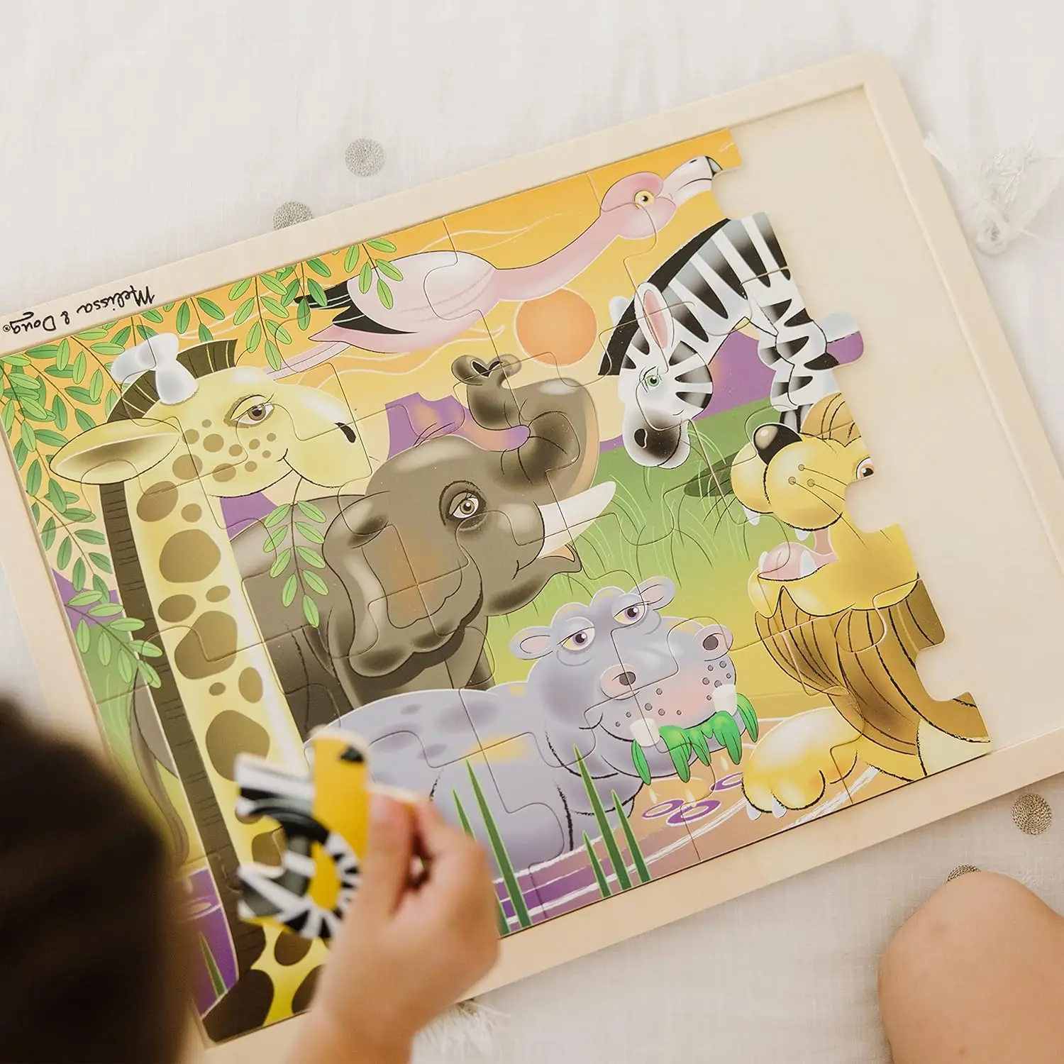 Melissa & Doug ตัวต่อจิกซอว์ไม้ซาฟารีเรียบสไตล์แอฟริกันพร้อมถาดเก็บ (24ชิ้น)