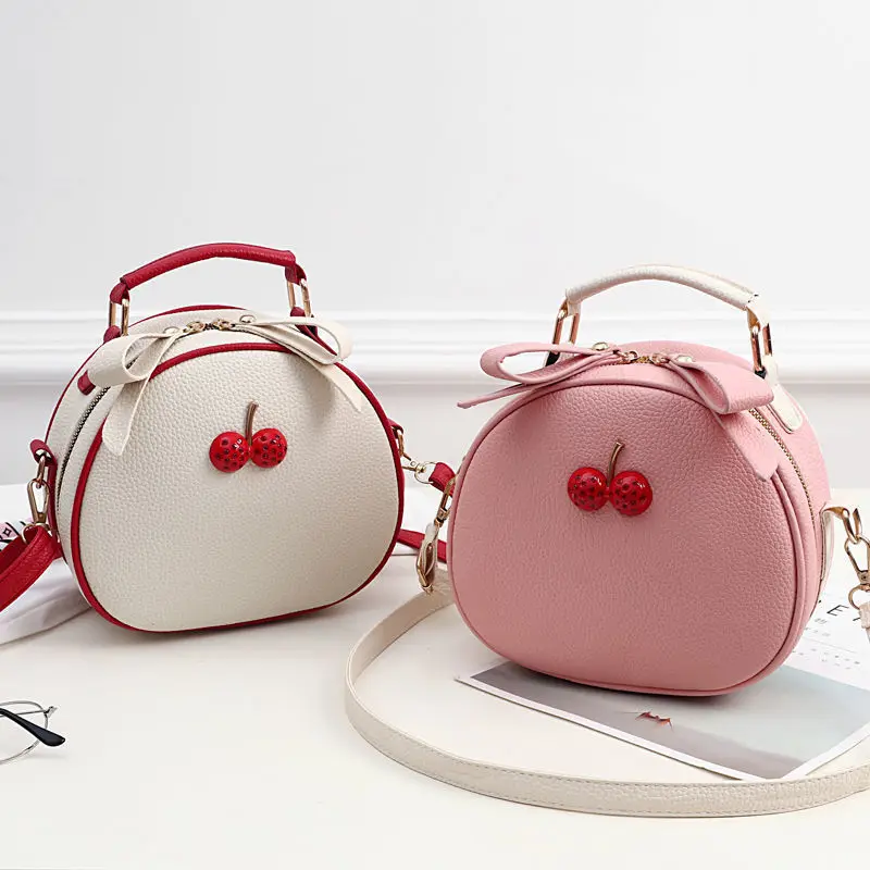

New ideas Litchi Pattern Contrast Color Cherry Small Backpack 2022 New Women's One-shoulder Messenger Mobile Phone Bag