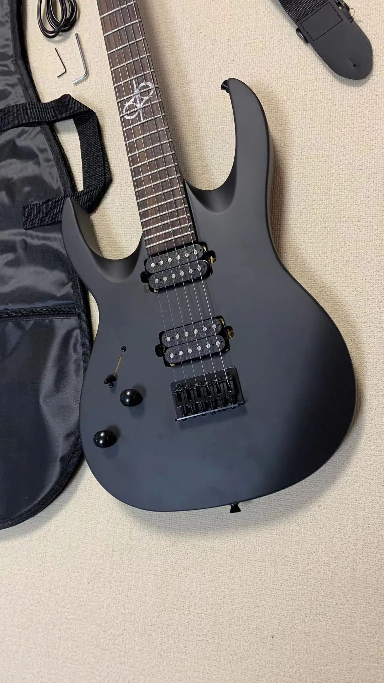 Customer custom 6 string left hand electric guitar, black body, black hardware, free shipping