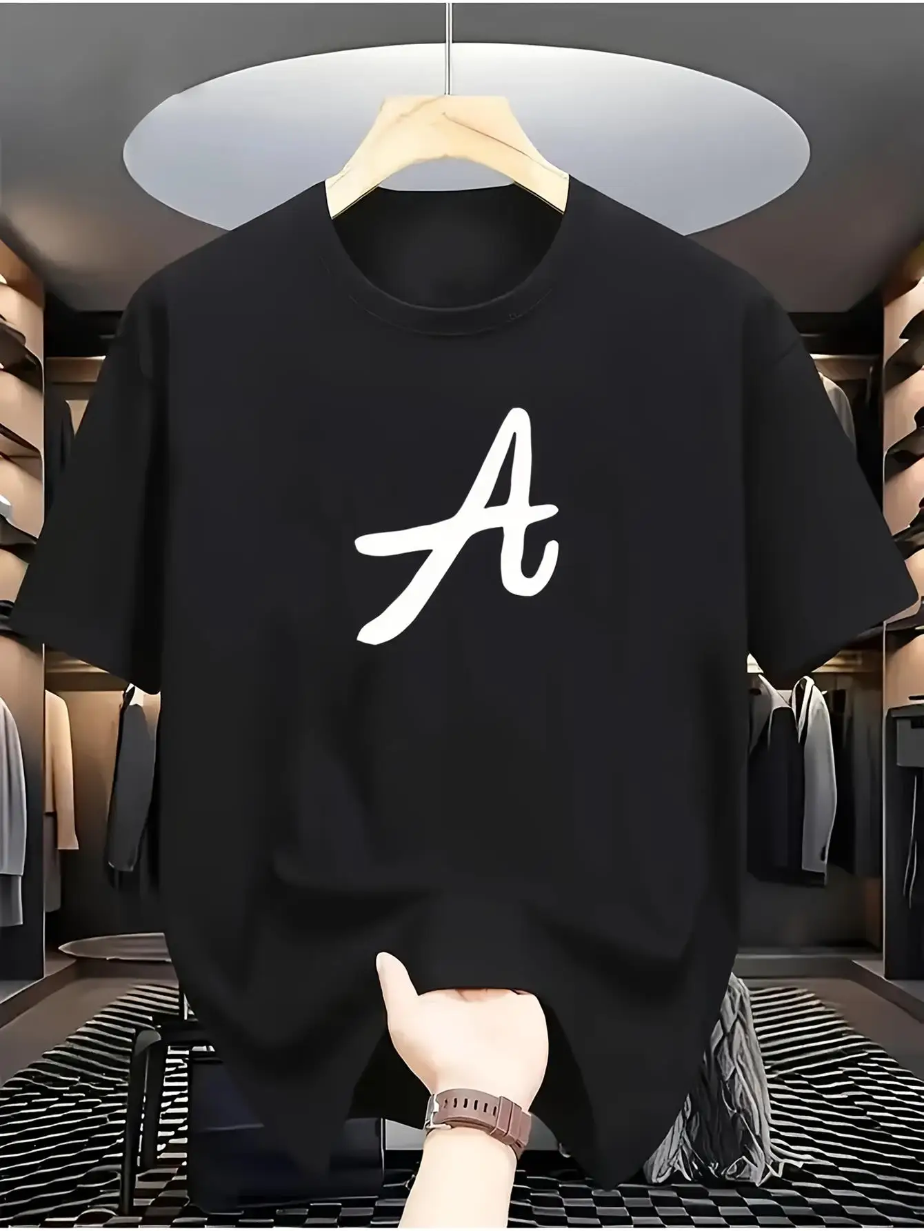 A Round-Neck Short-Sleeved T-Shirt with a Minimalist Font Style, Featuring a White Handwritten Capital Letter Print Design, Effortlessly Exudes a Trendy Vibe and Complements the Look with a Logo-Inspired Expression