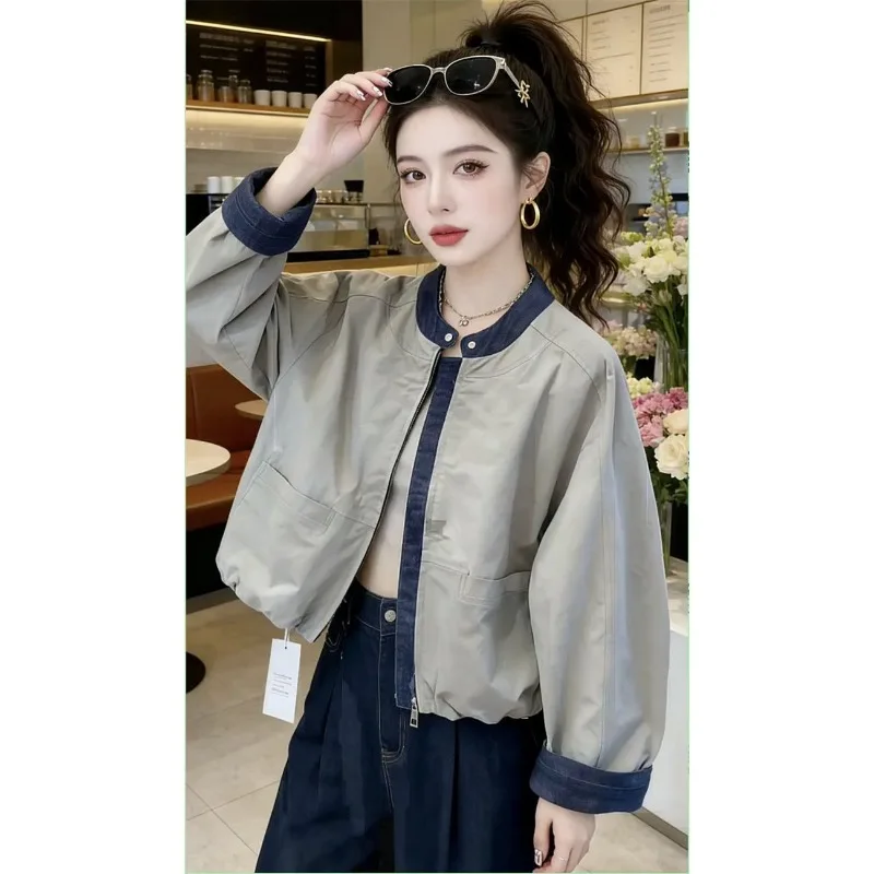 

This Is New Spring Trendy Denim Patchwork Jacket for Women Featuring Loose Stand-up Collar and Slimming Baseball Jacket Fashion