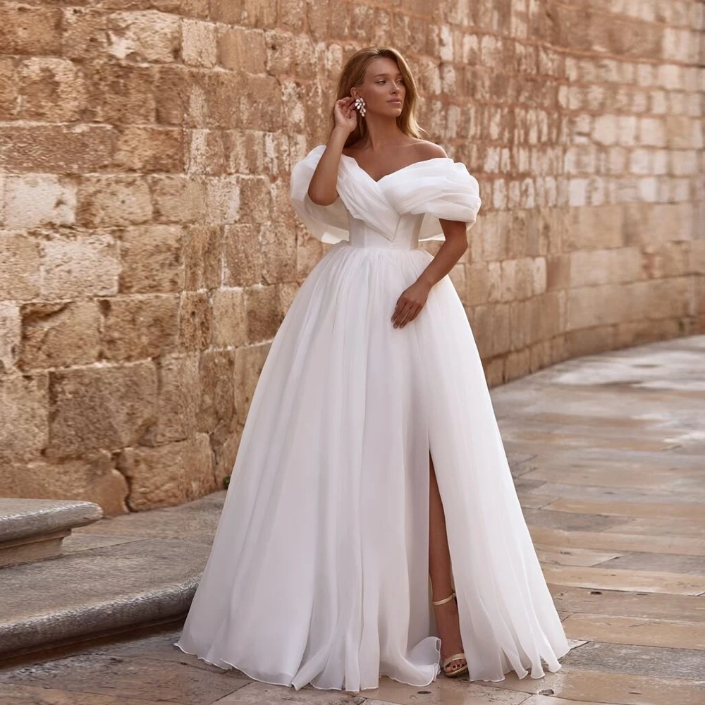 فساتين زفاف عاجية مخصصة مع الأورجانزا 2025 شق جانبي بدون حمالات كم كامل زي العرائس المرأة الصيف فيستدو دي نوفيا