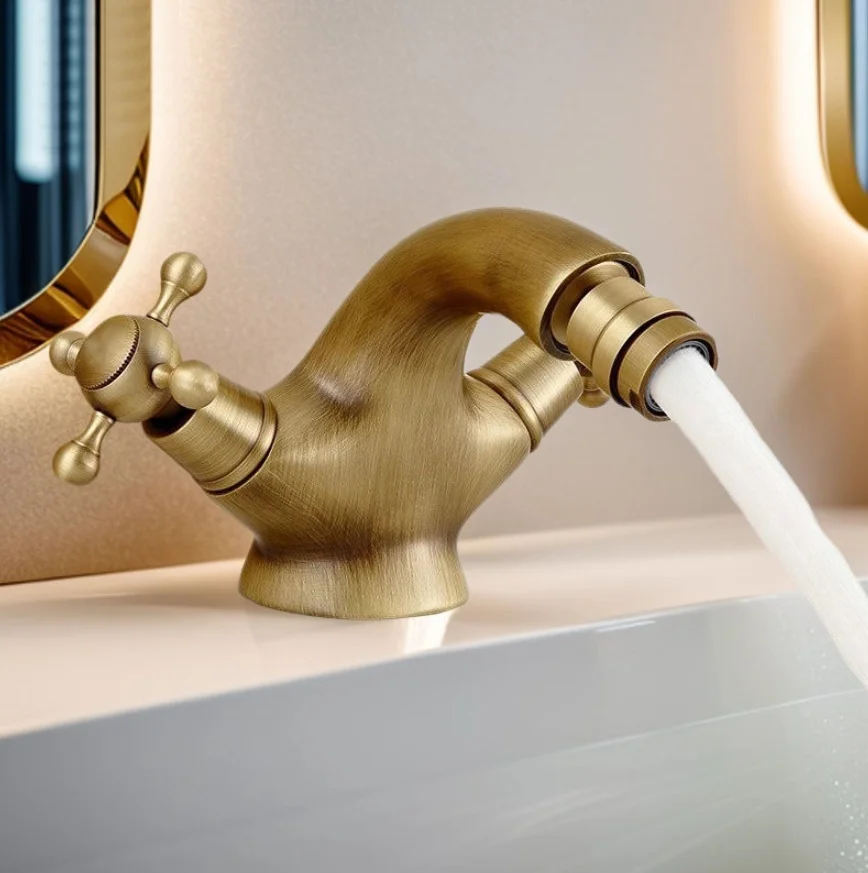 

Двухвентильный смеситель для раковины с двойным управлением и поворотным изливом для ванной и туалета, с подачей горячей и холодной воды.