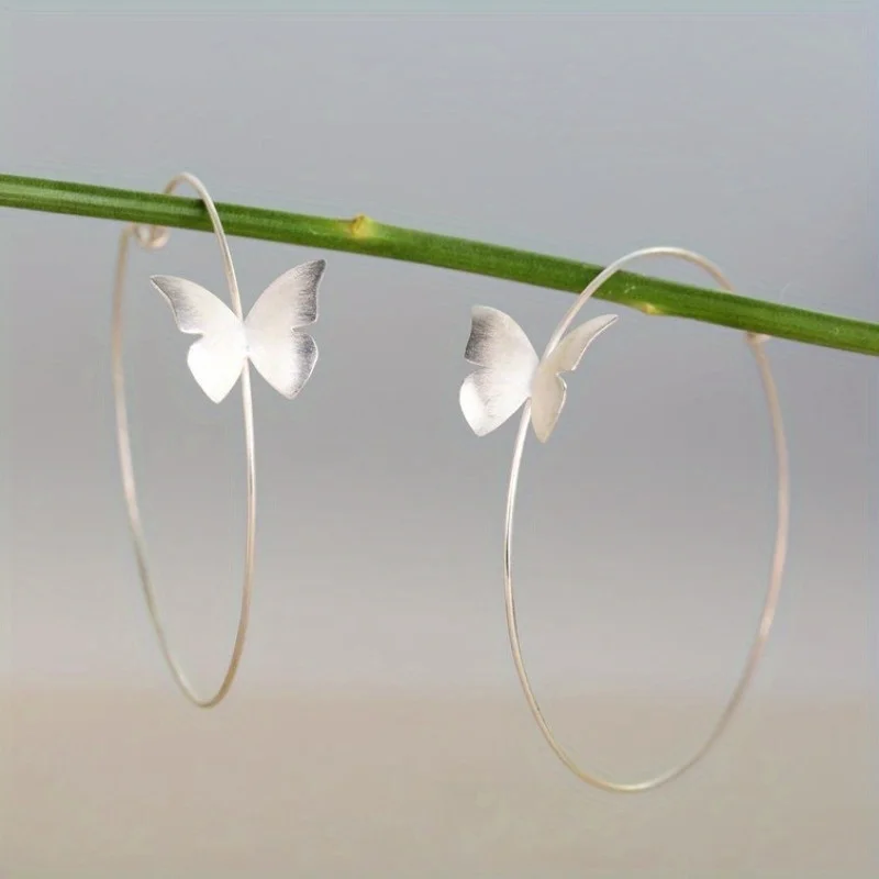 

Simple Fashion Silver Color Metal Glossy Surface Carving Butterfly Hoop Earrings for Women Jewelry