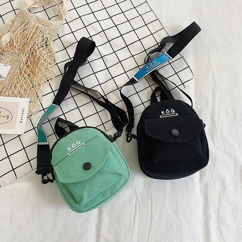 กระเป๋าผ้าใบมือถือกระเป๋าแฟชั่นเรียบง่ายลำลองกระเป๋าใส่เบนโตะกระเป๋าหิ้วกระเป๋าถือสตรีกระเป๋าพาดลำตัวสะพายไหล่เส้นเดียวนักเรียน