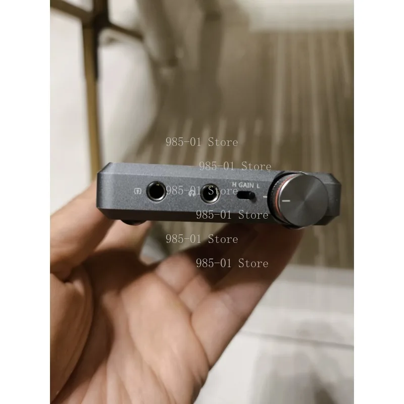 Portable headphone amplifier, lightweight wearable audio amplifying device