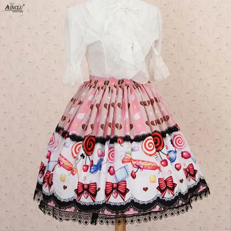 Faldas de encaje de princesa dulce Lolita para mujer, faldas plisadas con estampado de piruleta rosa de poliéster para verano, faldas bonitas de Lolita para niñas, disfraz de fiesta