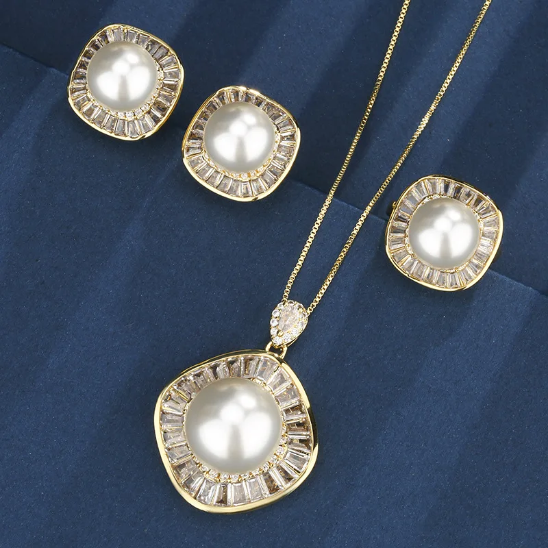 Elegant Gold Toned Pearl Jewelry Adjustable Rings Earring Pendant Necklace Sparkling Crystal Like Accents Timeless and Chic Gift