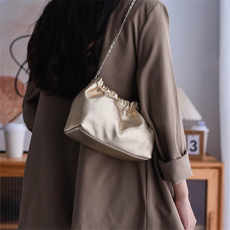 Fashion designers handmade luxury genuine leather women's gold shoulder bag weekend party cow leather ladies crossbody bag