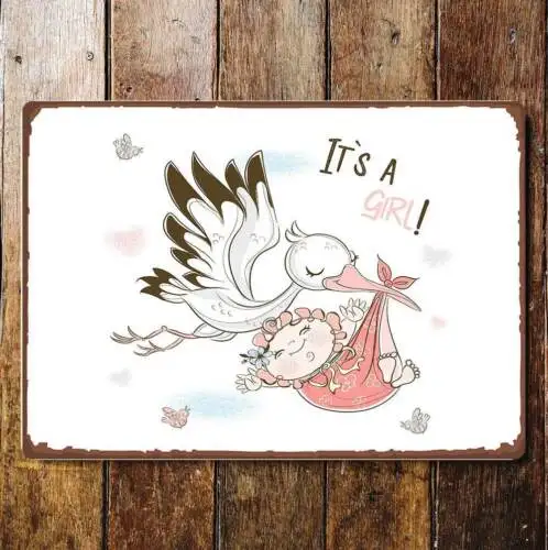 It's a girl stork metal wall sign plaque