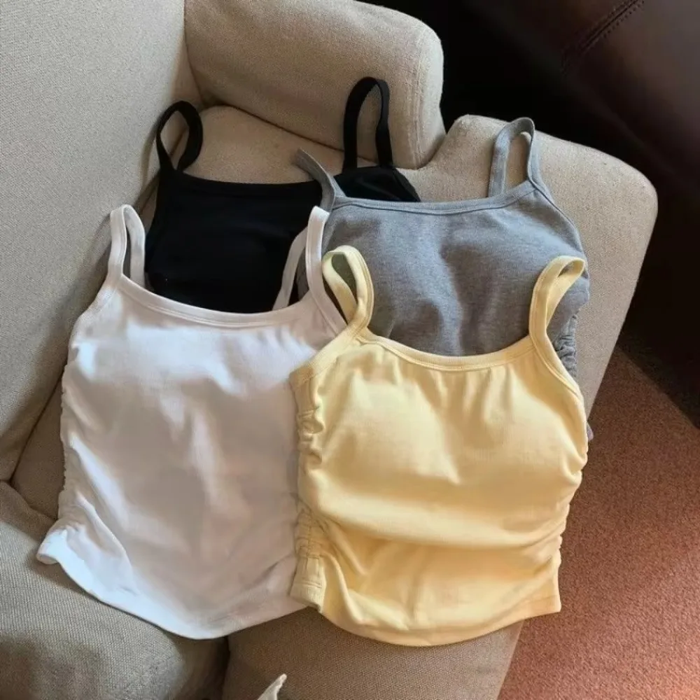 Nuove canotte da donna solide con protezioni per il petto Pieghe a costine Canottiera elastica attillata Canottiera corta senza maniche da donna