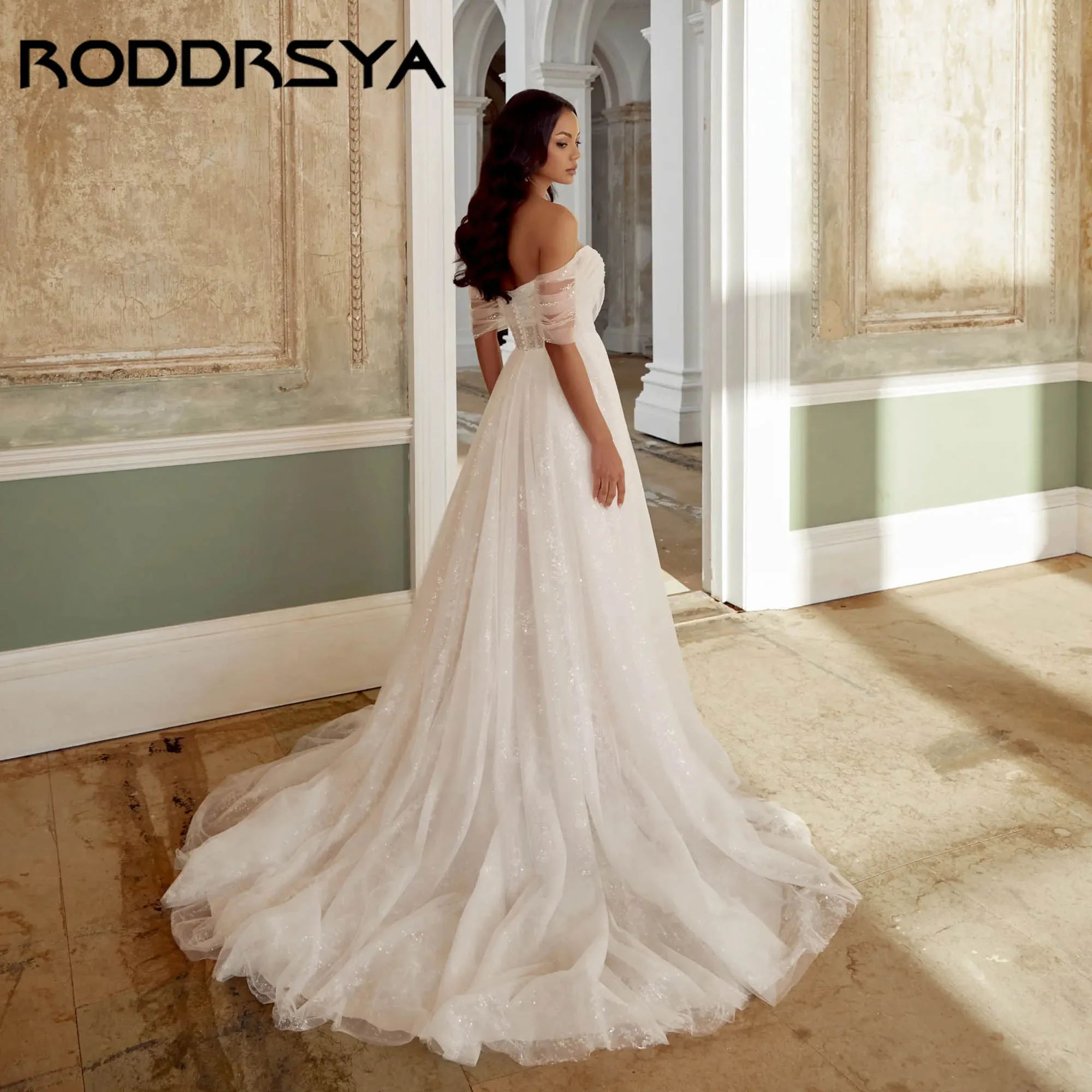 Suknia ślubna RODDRSY, linia A, tiul z efektem błyszczący, rozcięcie, odkryte ramiona, odkryte plecy, elegancka, dekolt w serduszko, vestidos de novia, możliwość personalizacji.