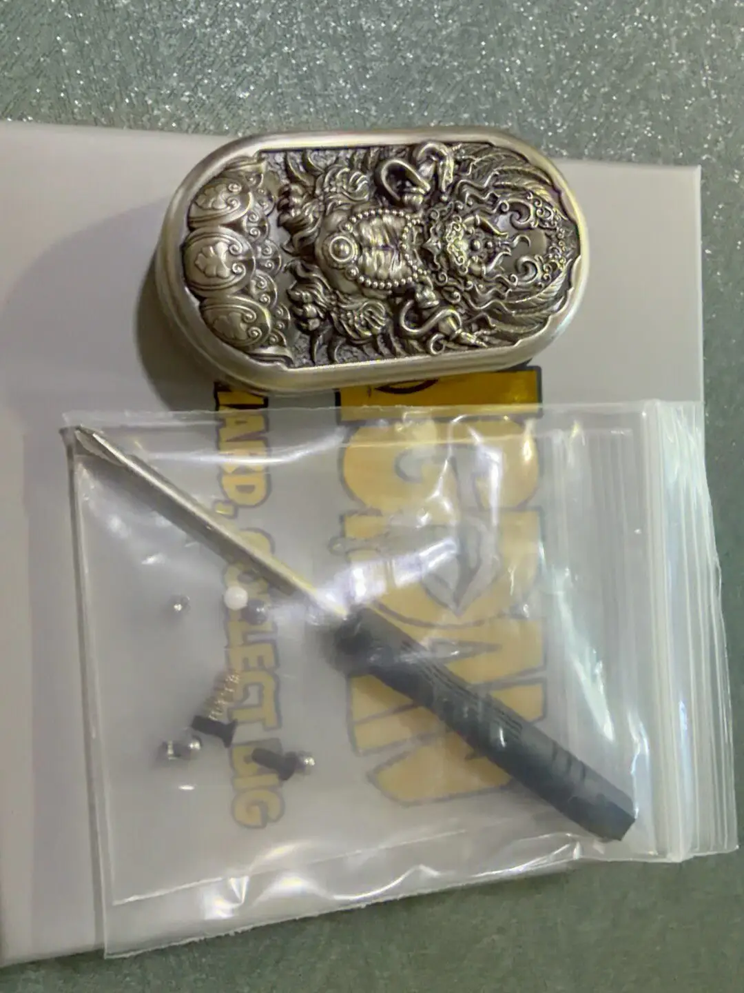 Used EDC Leyang white copper Dapeng bird mechanical push card, the main body white copper material, deep engraved patch