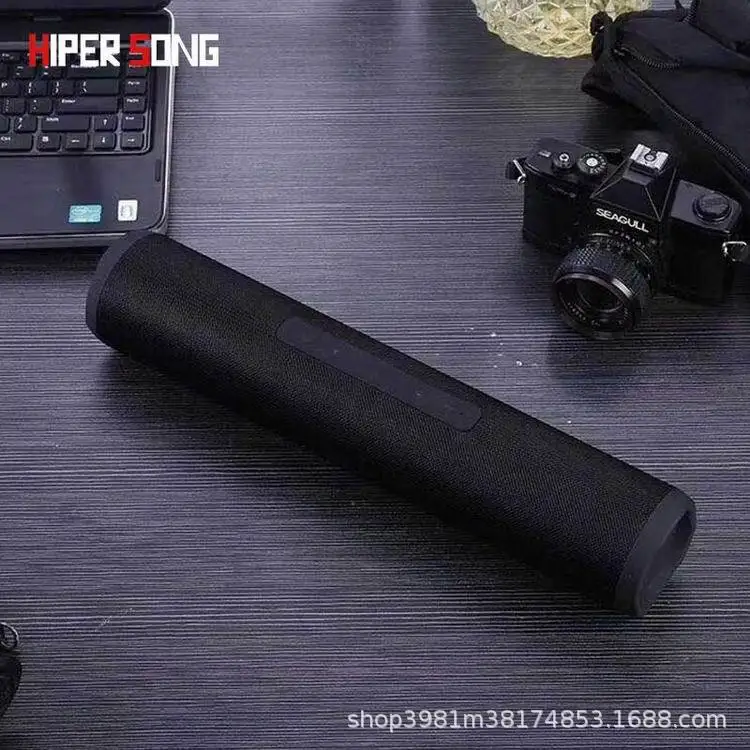 

New Bluetooth speaker, portable subwoofer card cloth art home outdoor audio factory sales