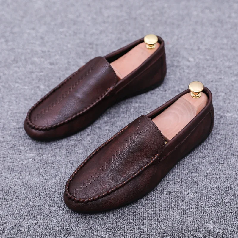 Mocassini da uomo firmati scarpe Casual in pelle di grandi dimensioni mocassini di marca di lusso Slip On Driving Shoes mocassini alla moda leggeri