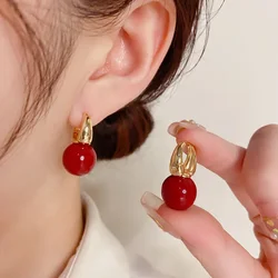 Japanese and Korean Temperament Red Pearl Earrings All-match Unique Design Sense Personality Simple Atmosphere Earrings.