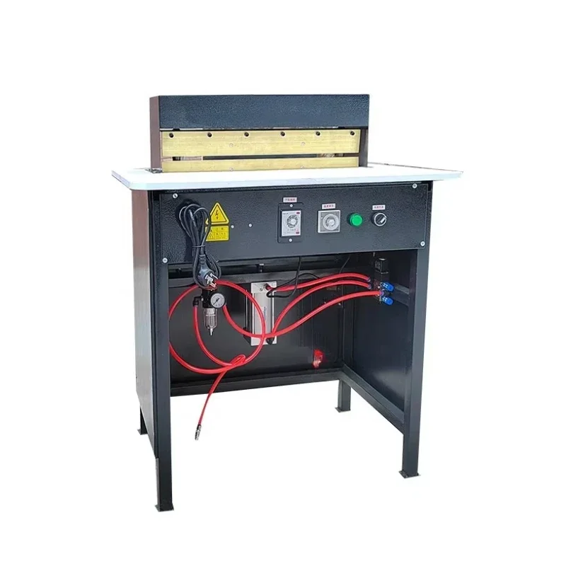 

Pneumatic hardcover book slotting machine