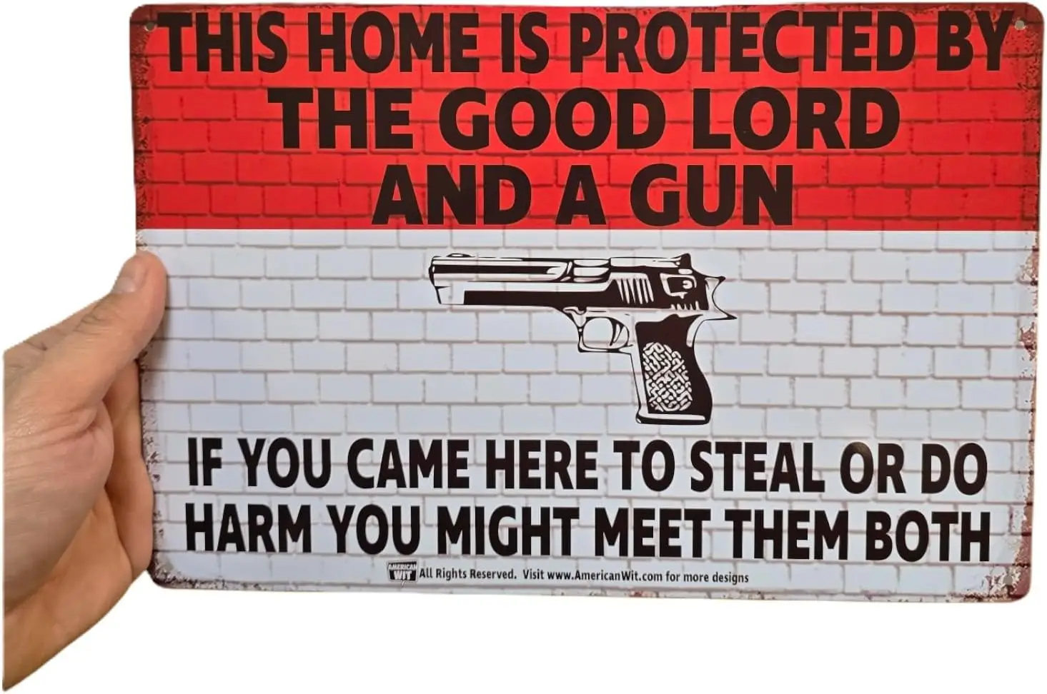 This Home is Protected by The Good Lord and a Gun - Tin Metal Sign () No Trespassing Warning Poster on Brick Wall with a Handgun
