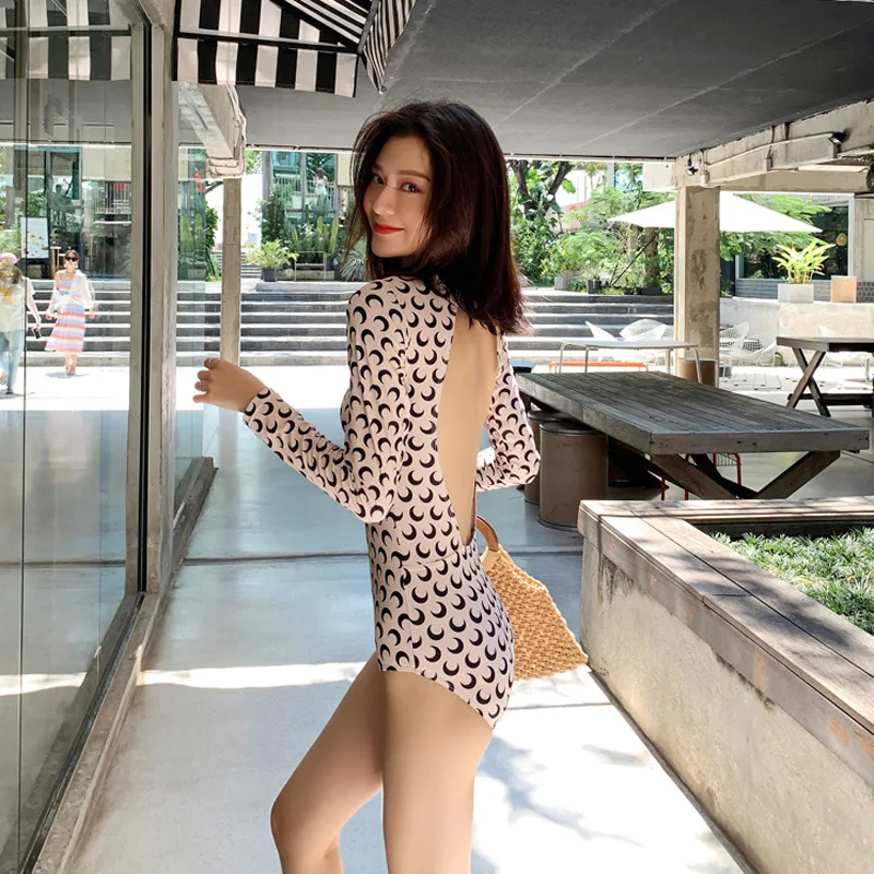 

Han's New Fairy Fan One-piece Hot Spring Swimsuit Female Belly Covering Thin Conservative Long-sleeved Sexy Backless Bikini