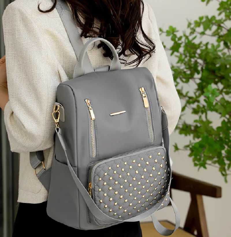 Korean Fashion Rivet Large Capacity Waterproof Nylon Backpack Women Anti Theft Travel Double Shoulder Bags Notebook School Bags