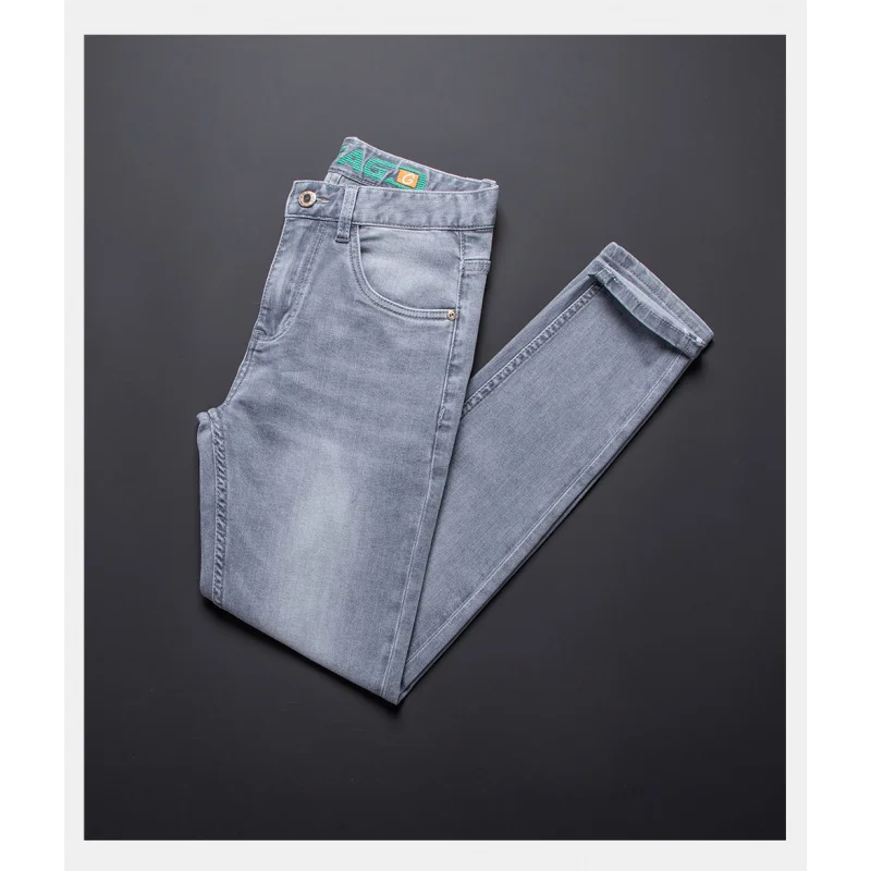 กางเกงยีนส์ผู้ชายอินเทรนด์ระดับไฮเอนด์ 2025 ฤดูร้อนกางเกงยีนส์ยืดบางแฟชั่นสลิมฟิตกางเกงสีเทาเท้าเล็ก