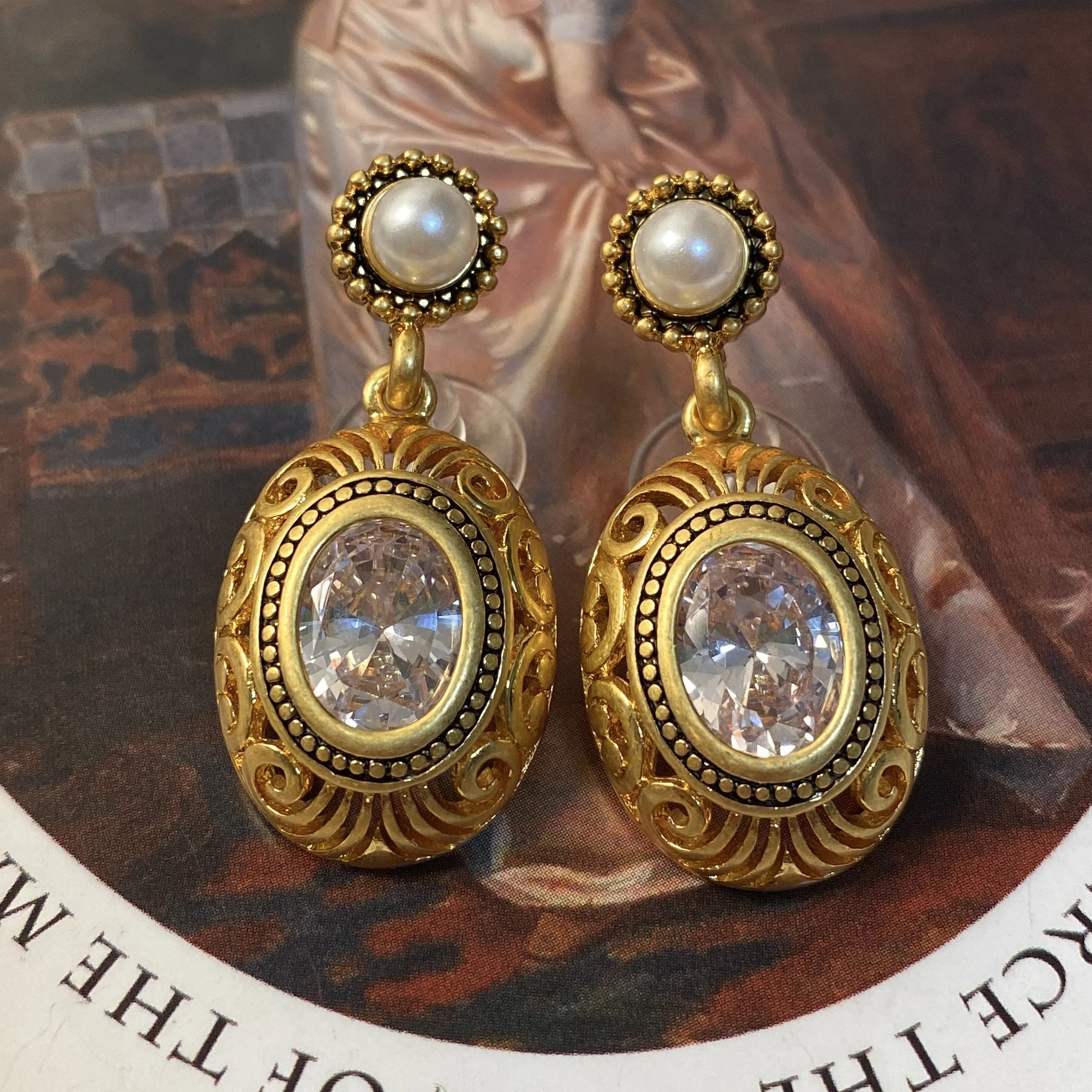 

Golden antique oval pendant earrings for women