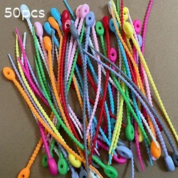 Reusable silicone cable organizer - cable ties, zipper pockets, and twisted straps for neat wire and cable management