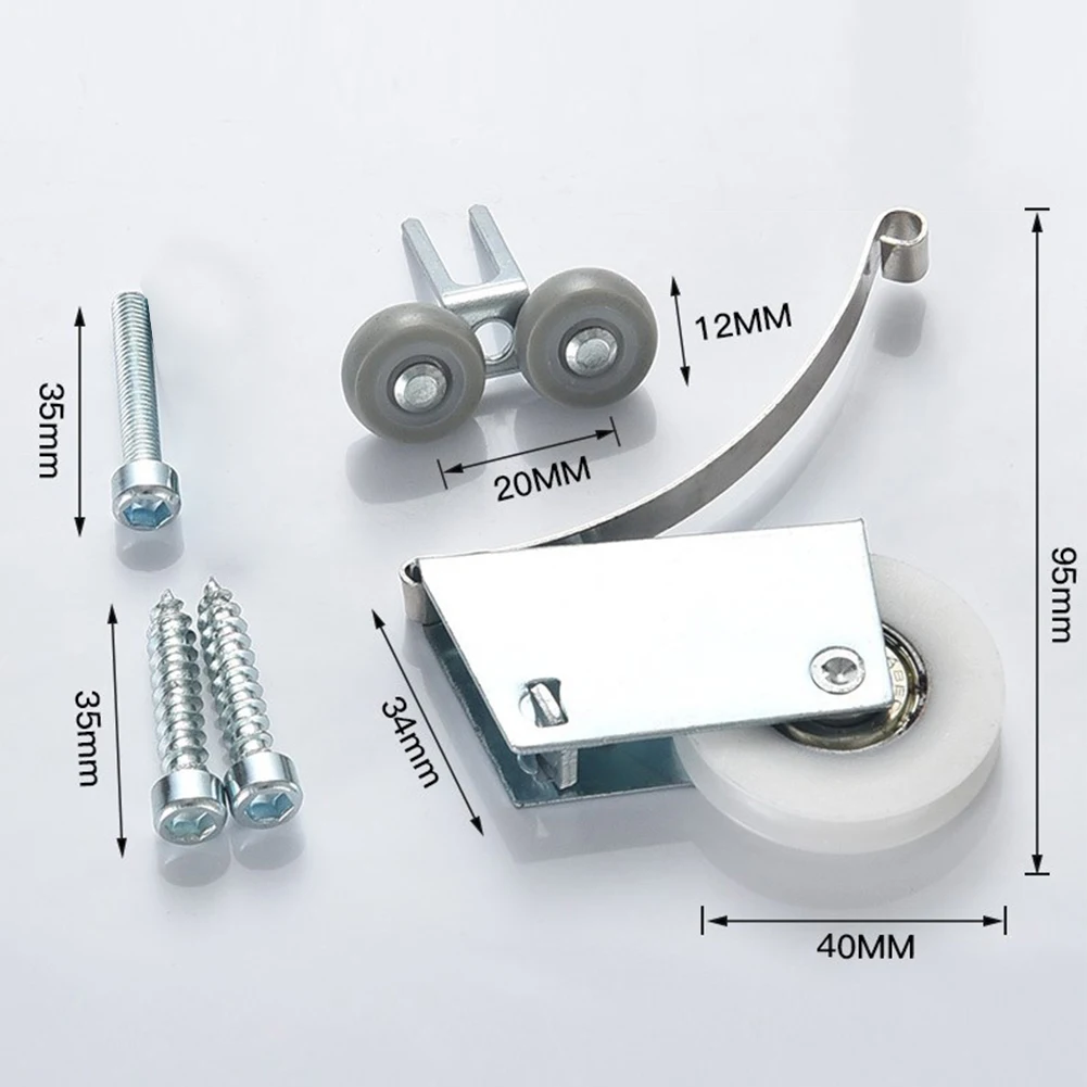 

Для использования внутри помещений: дверные ролики из чугуна, как показано на фото, долговечные, с точным литьем.