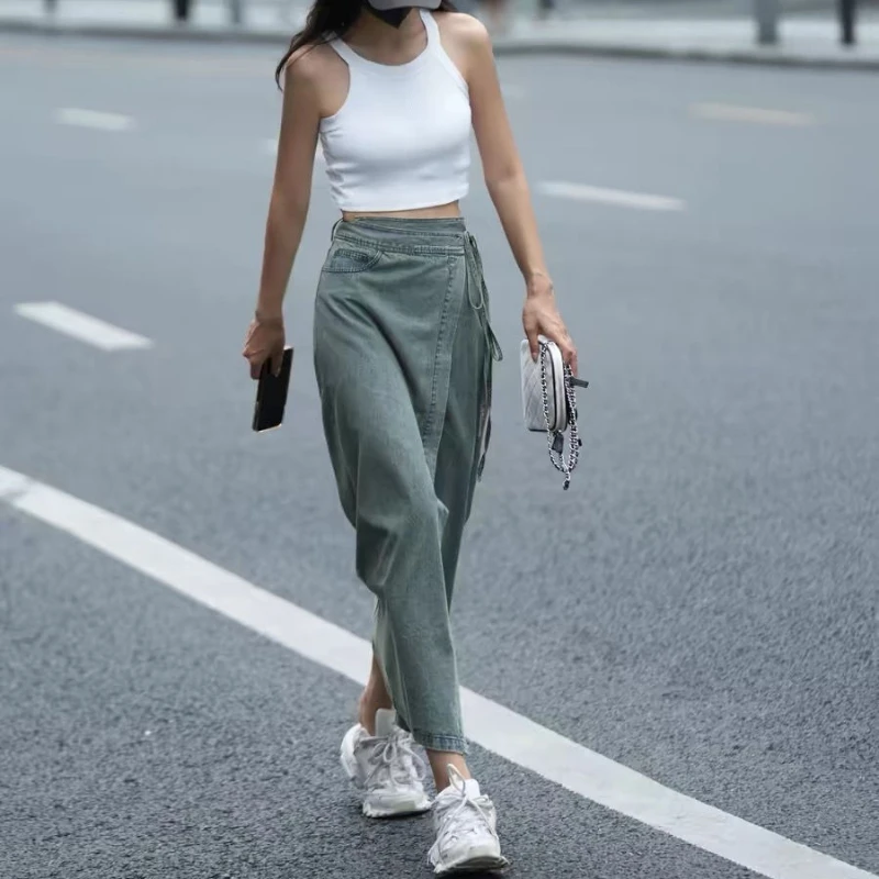 Temperamento falda de viajero diseño sentido correa lavada falda vaquera larga dividida moda de primavera y verano ropa de mujer