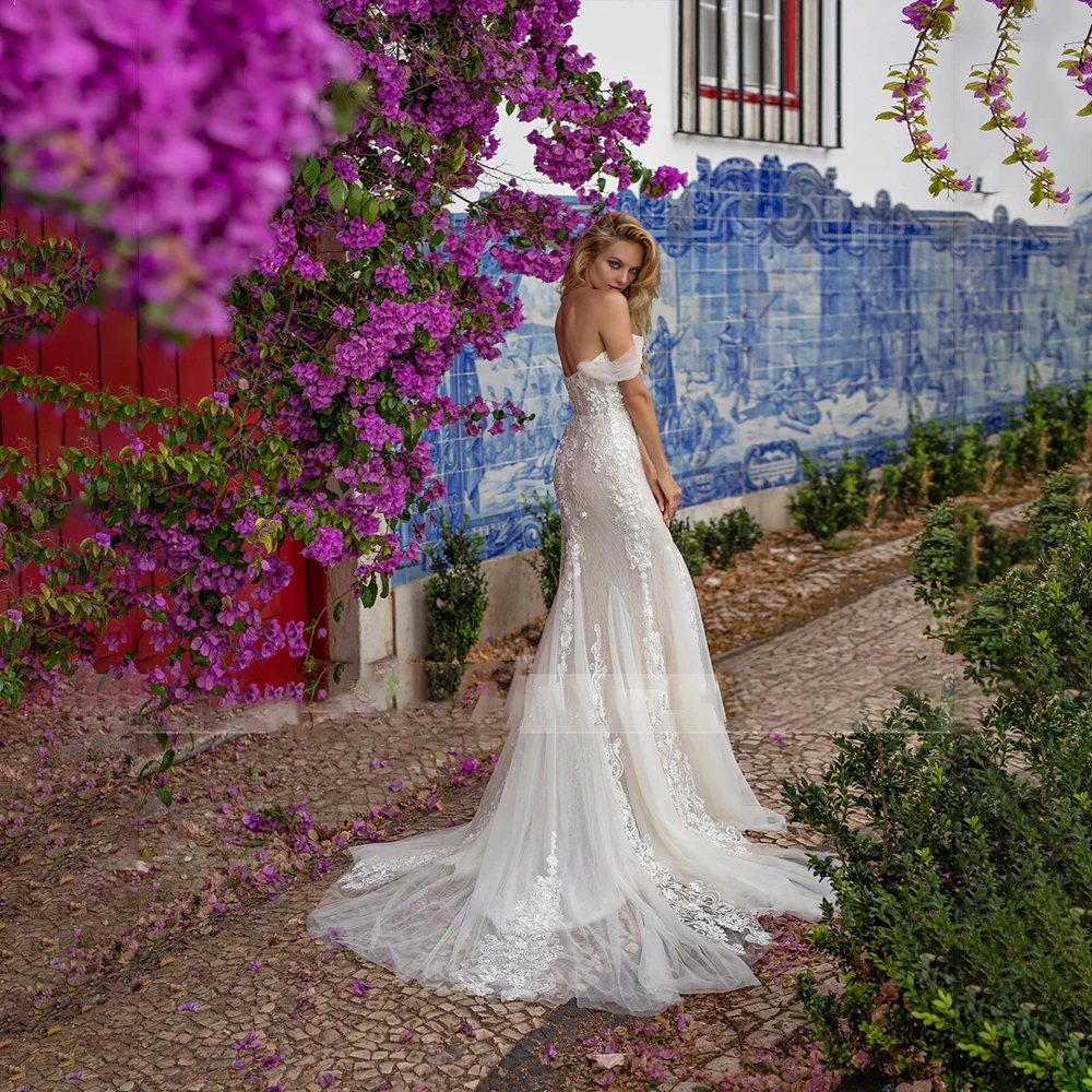 Abito da sposa sexy a sirena per abito da sposa senza spalline in pizzo senza maniche da donna Abiti personalizzati di alta qualità