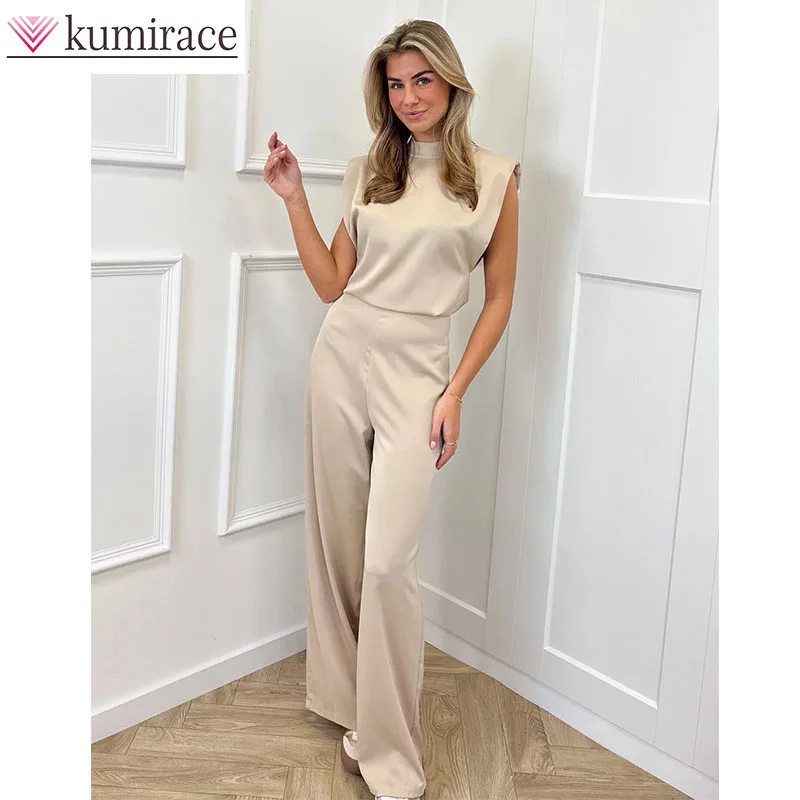 

Новый летний женский комбинезон 2026 года: однотонный, с воротником-стойкой, без рукавов, свободный, атласный, с открытой спиной, широкие штанины, черный