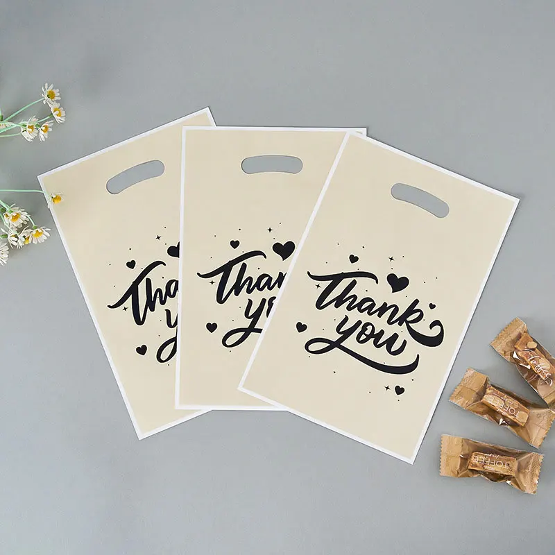 25/50 قطعة شكرًا لك حقيبة هدايا بلاستيكية لحلوى عيد الميلاد مع مقابض، أكياس هدايا للحفلات مثالية لملفات تعريف الارتباط والحلوى