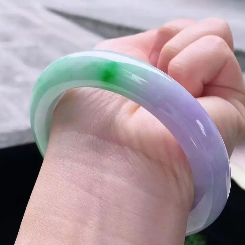 Ice-like glutinous-textured Burmese jade bracelet with spring-colored violet and bright green floral patterns