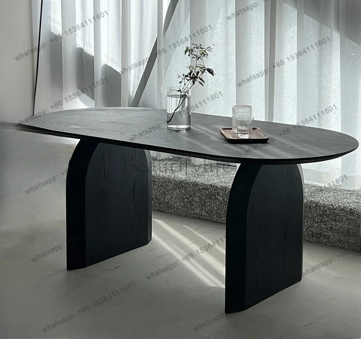 

Wabi Sand wind solid wood dining table Nordic home black oval minimalist dining table