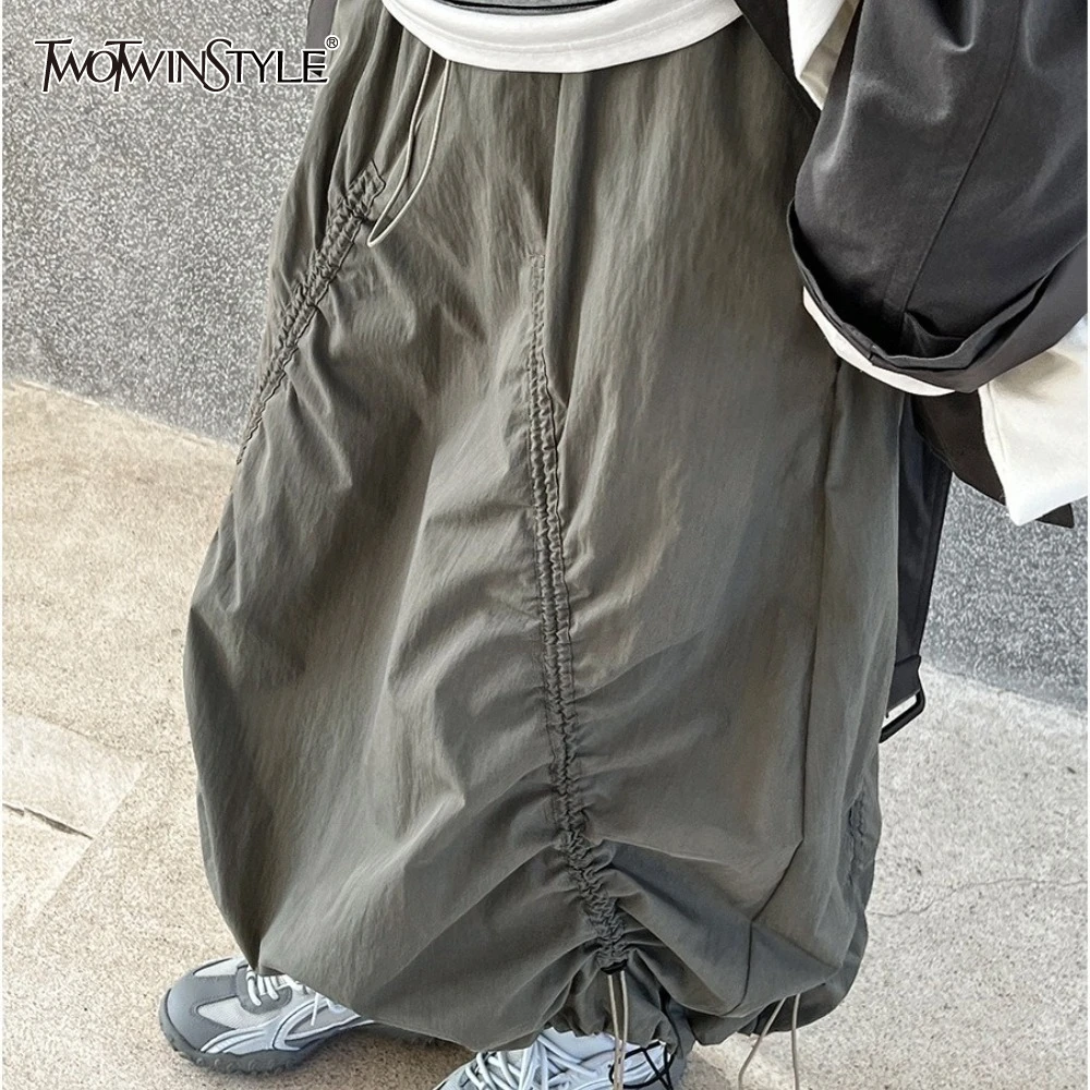 

TWOTWINSTYLE Solid Spliced Lace Up Loose Skirts for Women High Waist Temperament Minimalist Skirt Female Fashion Style