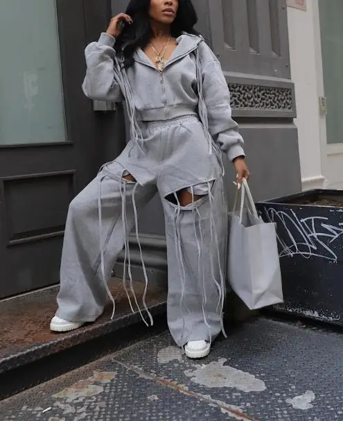 

2025 Fashionable Solid Color Lapel Hooded Sweatshirt Jacket High Waisted Fashionable Personalized Hollow Out Ripped Pants Set