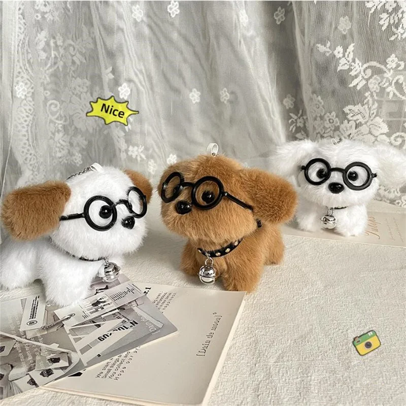 1PCS 9 ซม.น่ารักแว่นตาสุนัขตุ๊กตาพวงกุญแจจี้ Creative Bell ลูกสุนัขตุ๊กตาคู่กระเป๋าเป้สะพายหลังแขวนตกแต่ง