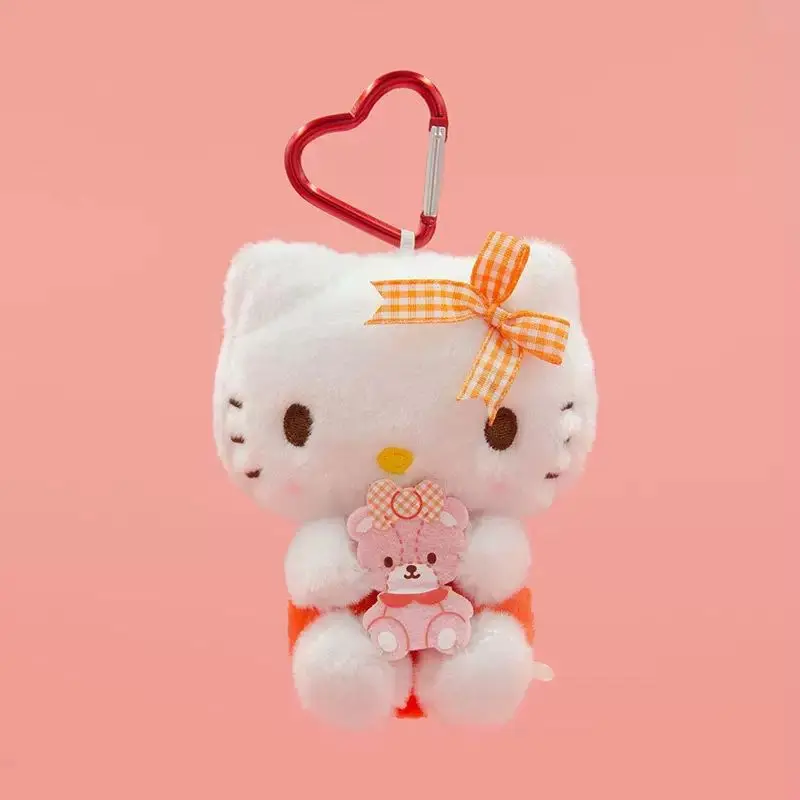 

Cute Hello Kitty plush pendant with orange bow and bear doll, suitable for keychains, bag decoration, full of cuteness.